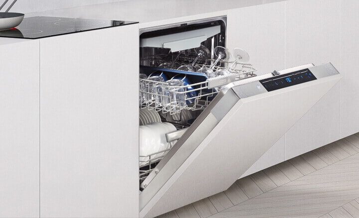 A beautiful white dishwasher full of recently cleaned dishes