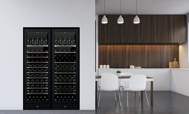 The sleek Vintec wine cabinet perfectly integrated in a beautiful modern kitchen