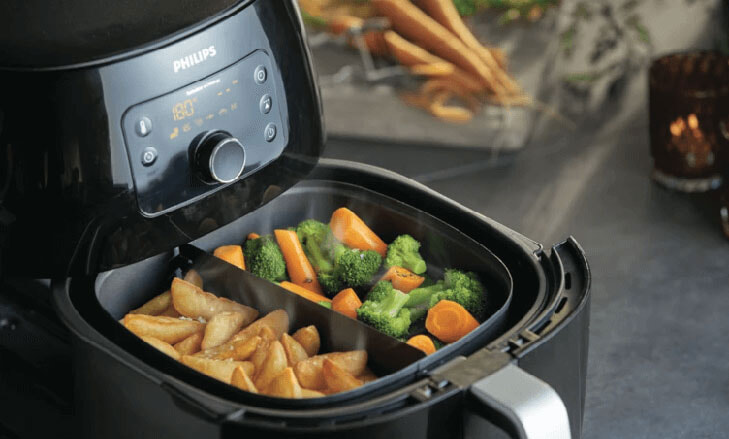 Twin draw Philips Air dryer with perfectly cooked vegetables and potato chips