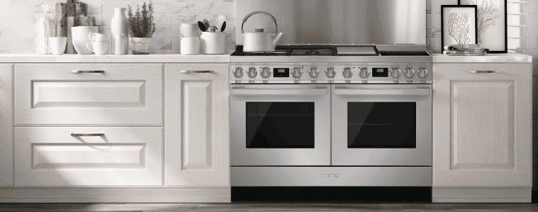 A double freestanding cooker in a Hamptons style kitchen.