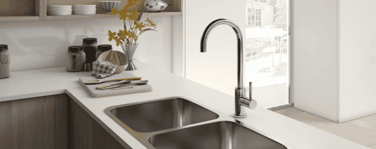 A chrome sink and tap in a Hamptons style kitchen.