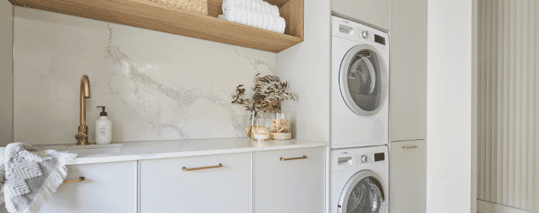 A beautiful modern laundry designed with neutral tones