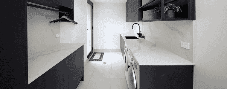 A modern monochrome laundry room