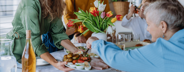 Image of family eating around a table 