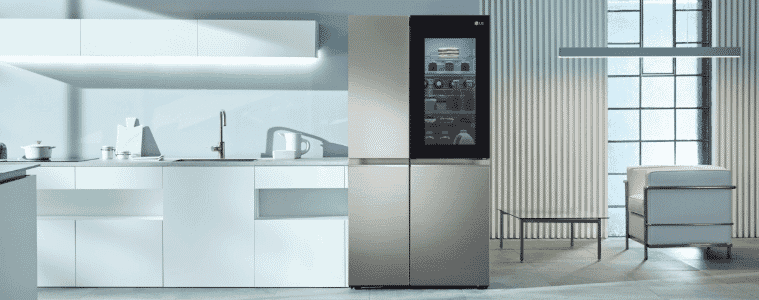 A silver LG French door fridge with a clear window sits in a white kitchen.