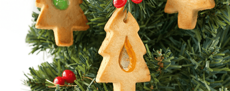 Stained Glass Christmas Biscuits hang from a Christmas tree.