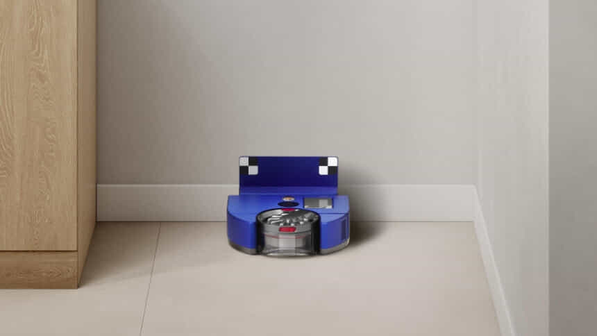 Dyson robot vacuum situated in the corner of a room