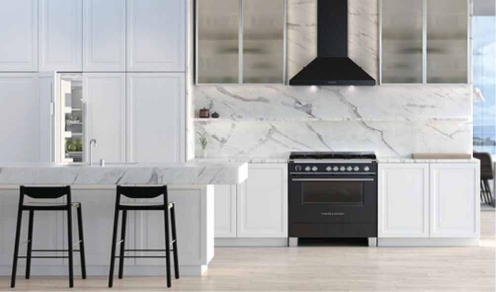A black Fisher & Paykel freestanding oven and rangehood in a modern white kitchen