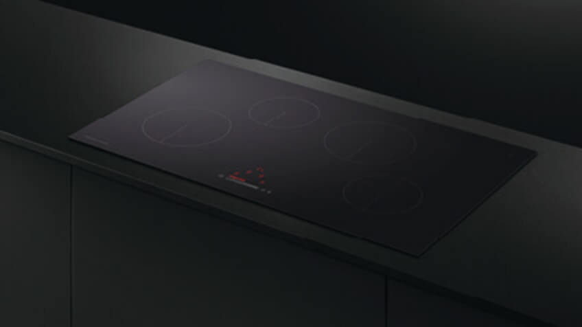 Black Fisher & Paykel cooktop in a kitchen