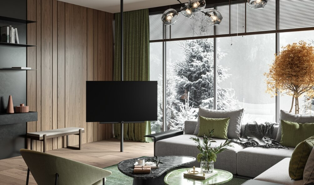 The LOEWE Bild TV range showcased in modern lounge room, looking onto snowy outdoor area