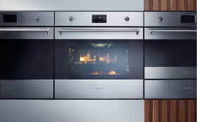 A row of three Smeg Galileo Classic ovens