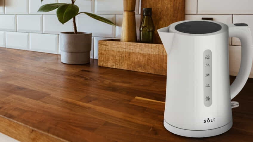 White Solt Kettle on kitchen countertop. 