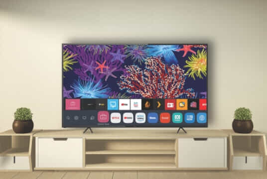 Linsar displayed with plants, showing its many smart features.