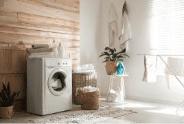 Front loader washing machines in a bright laundry.|The Good Guys 