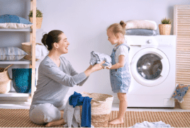 Mother and daughter folding laundry together.| The Good Guys