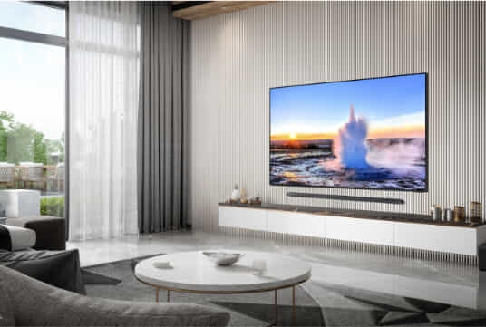 New Samsung TV in light living room.