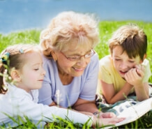 Grandma reading to her grandchildren this Mother’s Day