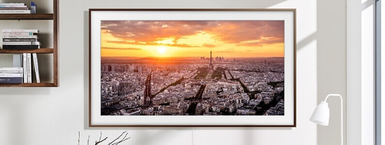 Samsung The Frame TV showcasing the Paris skyline as a piece of art