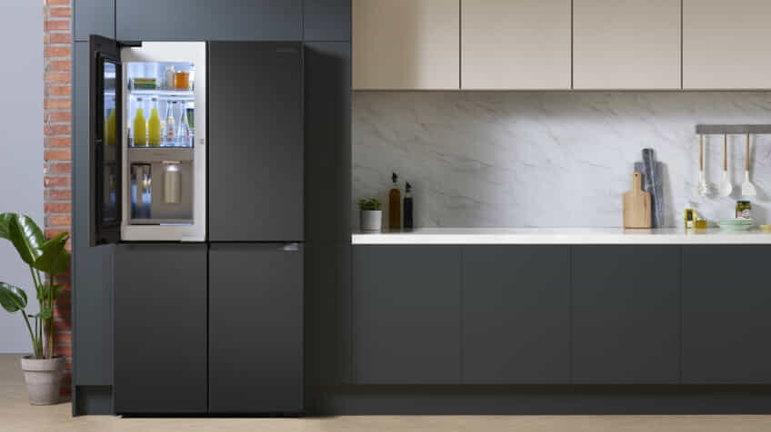 The top left door of a Samsung French door fridge is open, revealing the Beverage Centre.