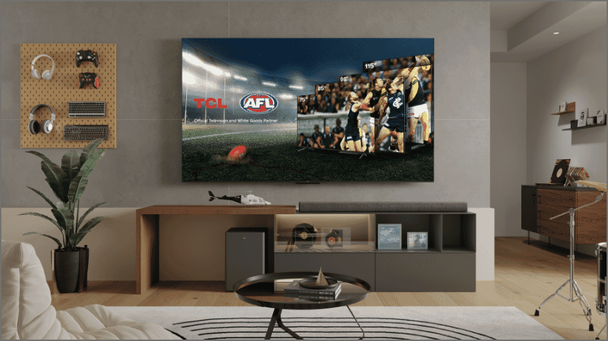 Soccer players chase the ball at the world cup on a TCL C745 TV.