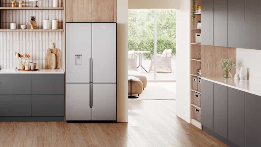 A Westinghouse fridge in a grey and light timber kitchen.
