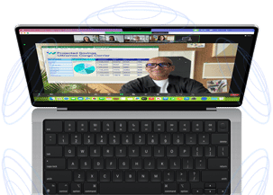 MacBook Pro surrounded by illustrations of blue circles to suggest the 3D feeling of Spatial Audio — Onscreen, a person uses the Presenter Overlay feature in a Zoom video meeting to appear in front of the content they are presenting