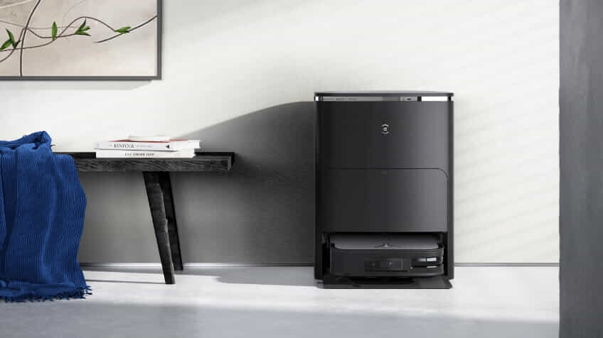 New ECOVACS DEEBOT Robot square vacuumed tucked in stylish home.