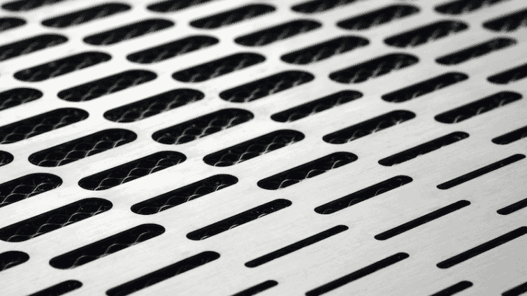 A close up of the holes in an ASKO rangehood.