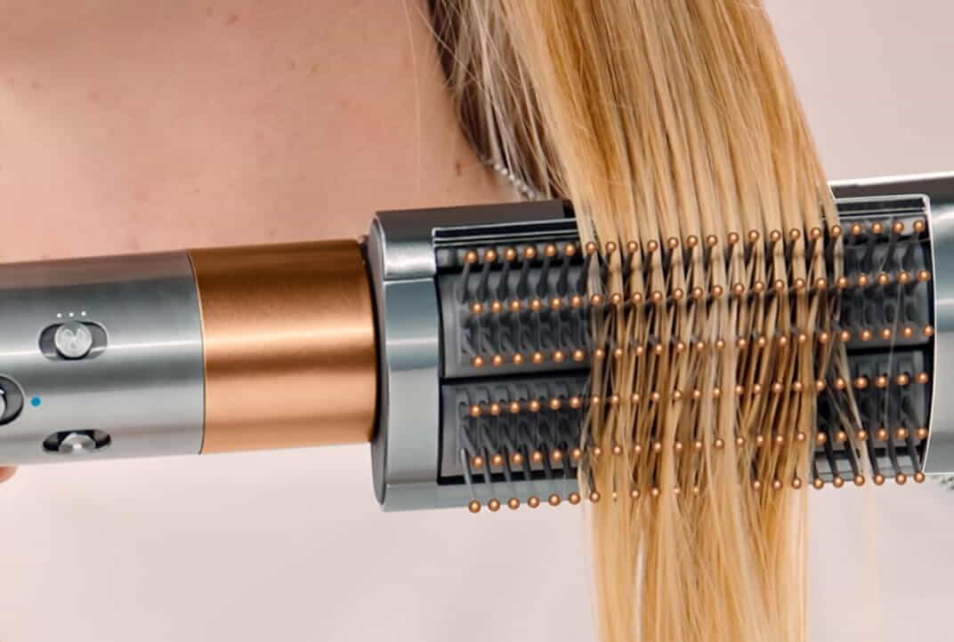 Use the spinning barrel on an airwrap of a curl.