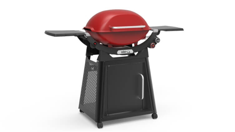 A full body shot of a Weber Family Q BBQ in red | The Good Guys
