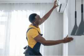 A young family spend time together in their living room.