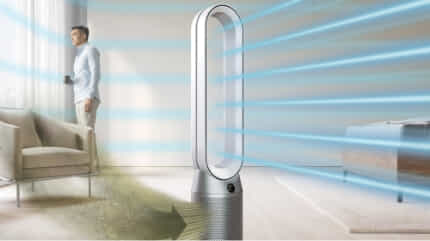 A Dyson Purifier Cool purifies and cools a man's living room.
