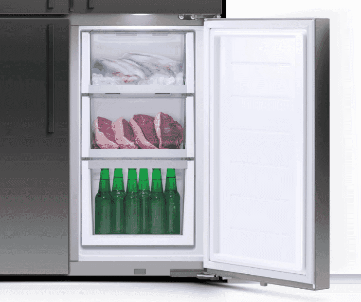 The open bottom right door of a Quad Door Refrigerator