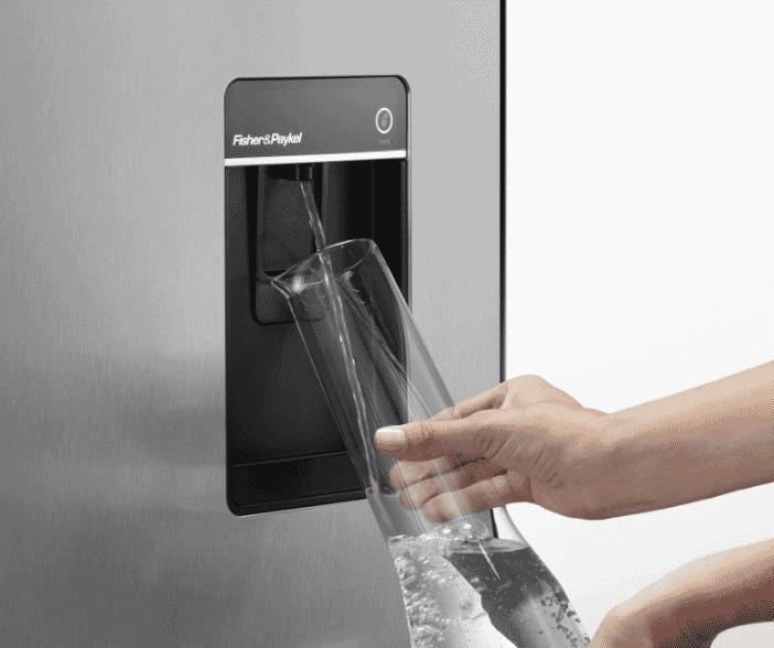 A close up of the slimline water dispenser featured on the Quad Door Refrigerator