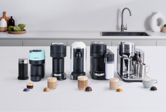 Nespresso's coffee machine range lined up in a row.