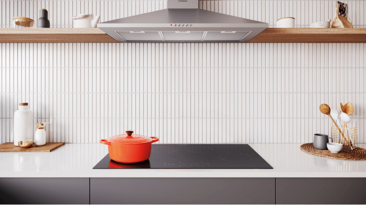 Lifestyle image of a modern kitchen featuring a Westinghouse induction cooktop.