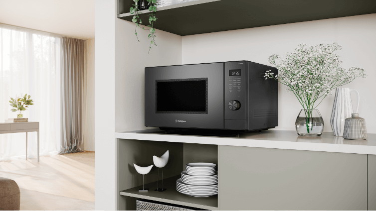 Lifestyle image of a modern kitchen featuring a Westinghouse microwave.