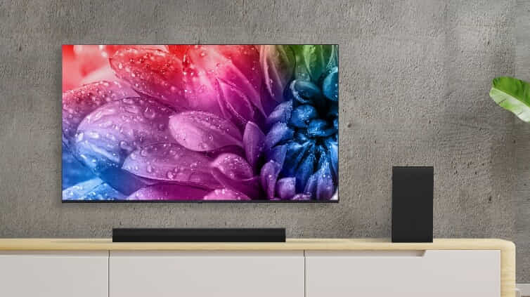 LG UHD TV with flowers on screen.