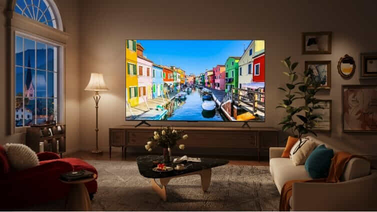 TCL QLED Televisions: A video game character is displayed on a TCL QLED TV in a modern living room.