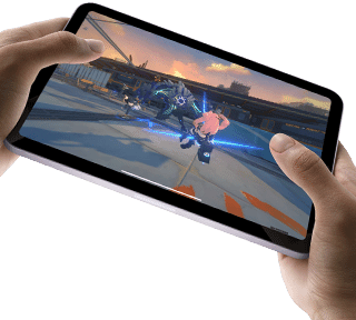 iPad mini held by a user's hands in landscape view playing a graphically intense game