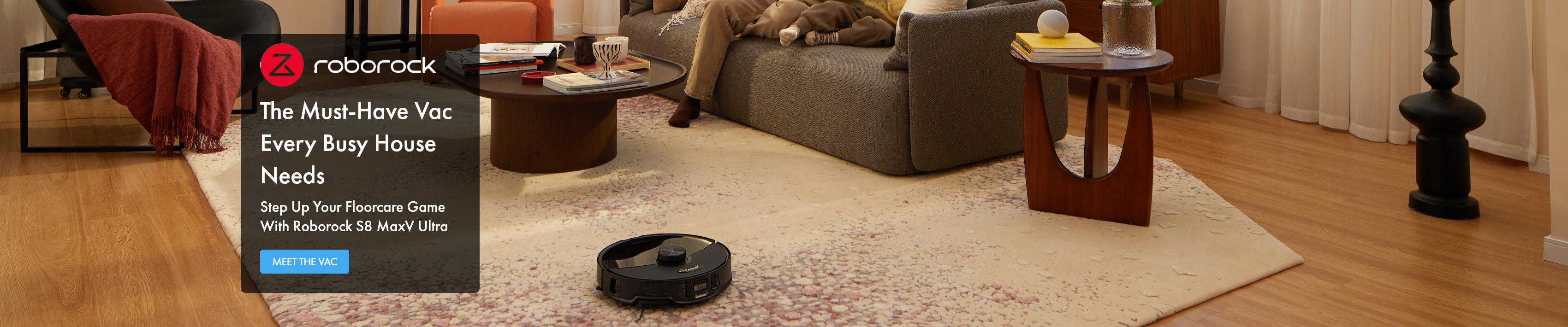 Roborock S8 MaxV in living room vacuuming rug.