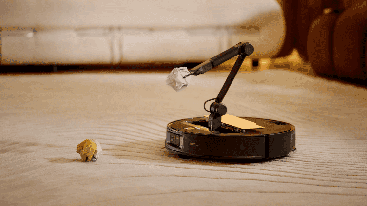 Saros Z70 Robot Vacuum picking up rubbish with arm