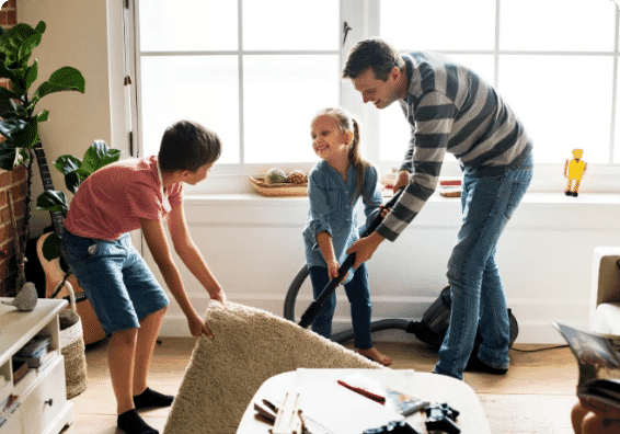 two children give a present to their dad