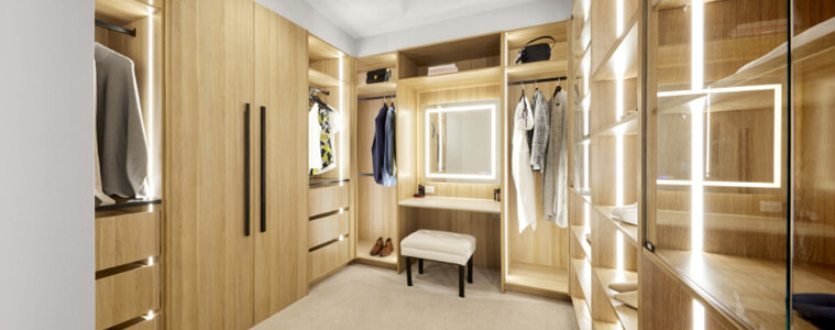 A light timber walk-in robe.