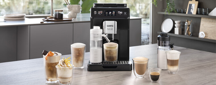 A DeLonghi Eletta Explore sits on a modern kitchen bench with a variety of hot and cold coffees.
