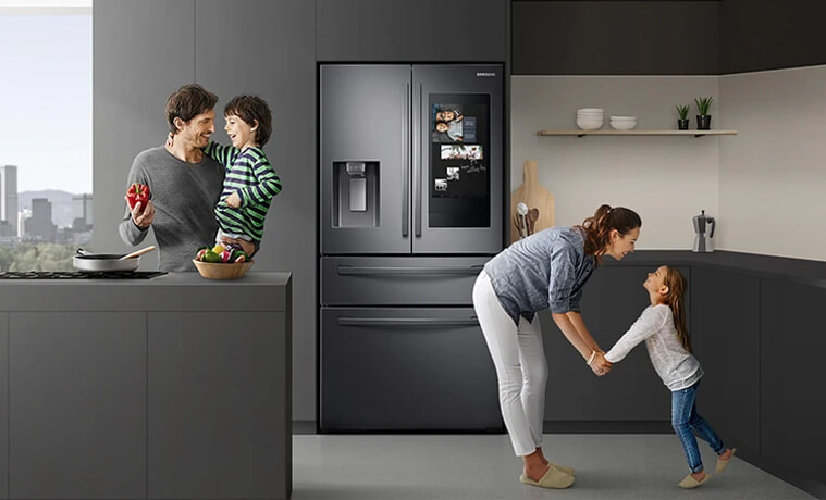A young family get ready in the morning with help from their smart fridge.