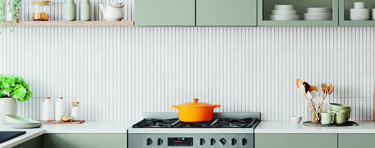 A Westinghouse cooktop in a white and sage green kitchen.