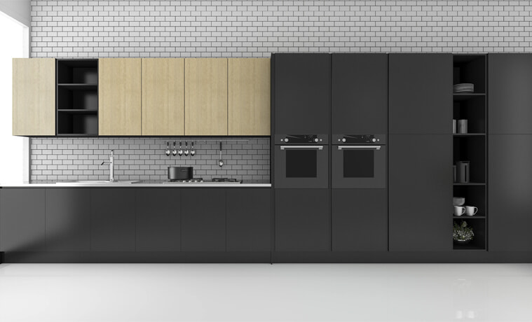 A black kitchen with integrated appliances.