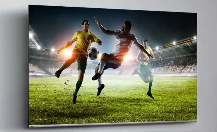 People playing soccer on Toshiba TV