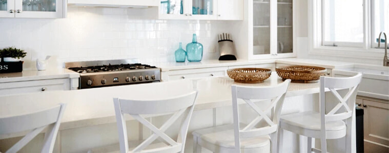 A white, modern Hamptons style kitchen.